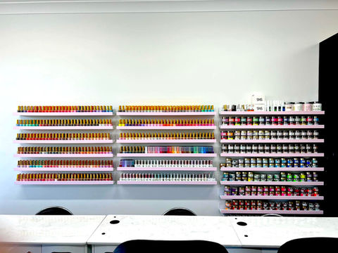 Nail colour collection displayed in the salon