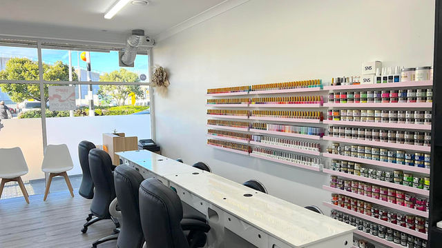 Manicure stations and nail colour shelves
